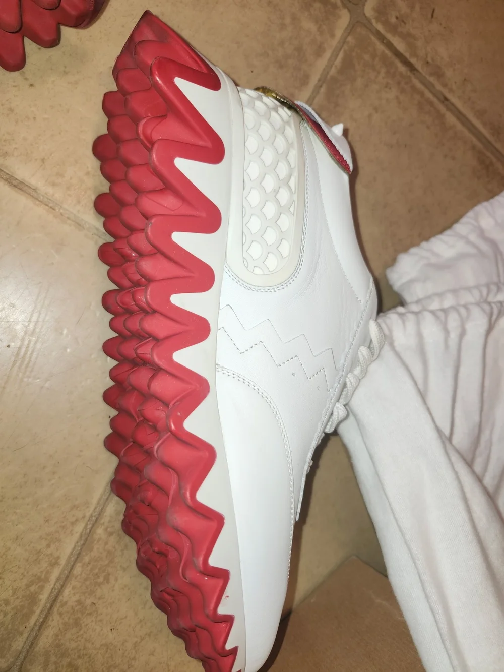 Christian Louboutin sleek white